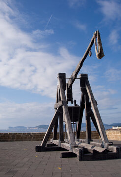 Catapult in Alghero. Antique catapult by Alghero promenade, Sardinia 