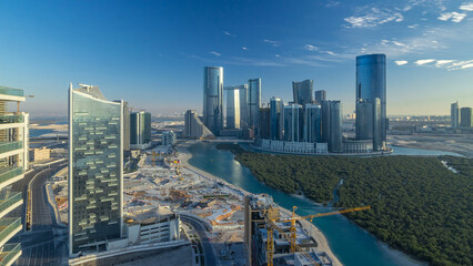 Buildings on Al Reem island in Abu Dhabi timelapse from above.