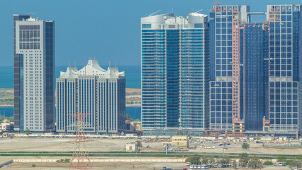 Buildings on Al Reem island in Abu Dhabi timelapse from above.