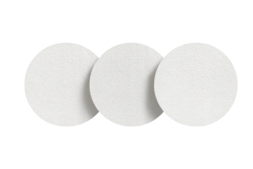Three circular, white filter discs