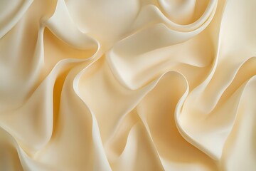Fototapeta premium Creamy folds of flowing fabric create a smooth, elegant texture for backgrounds and designs