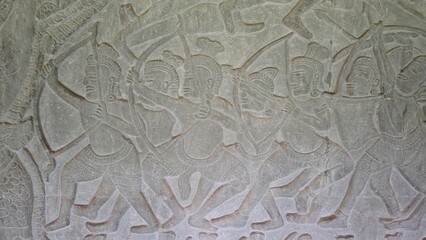Angkor Wat, Cambodia - 3 July 2025. Bowmen in formation are shown drawing weapons with rhythmic...
