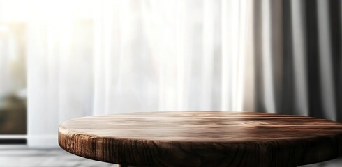 Blurred living room interior with a round wooden table and sofa on a white curtain background, providing copy space for product presentation mock-up design. Minimalist home decor concept. Stock photo 