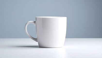 Fototapeta premium Simple white mug on a light gray surface