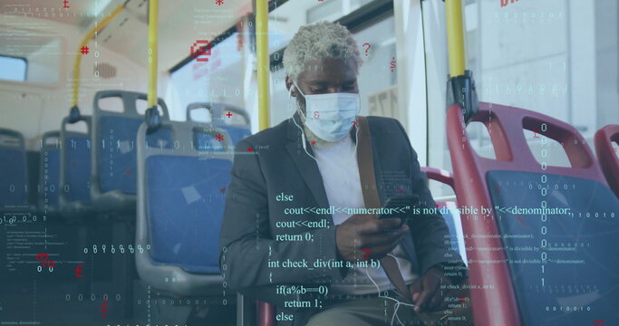 Man wearing business attire checking smartphone with wired earphones and surgical mask on bus