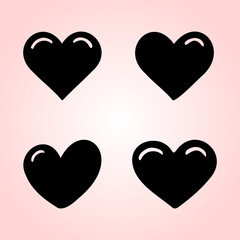 Four black heart shapes on a pink background