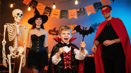 A lively Halloween party scene featuring a group of friends dressed in festive costumes, celebrating with joy and laughter. Halloween, Halloween Costumes, Halloween Background, Happy Halloween