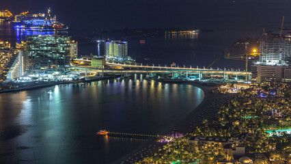 Obraz premium Aerial view of Palm Jumeirah Island night timelapse.
