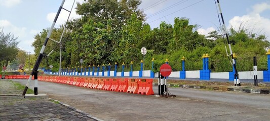 Road barrier: A captivating shot of a barrier system, a vibrant scene. The focus remains on the...