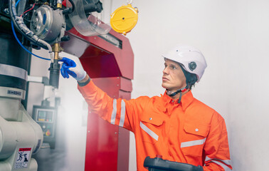 Mechanical engineering team working in robotic technology lap for research and develop for manufacturing automation and robotics.