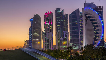 The high-rise district of Doha day to night timelapse after sunset