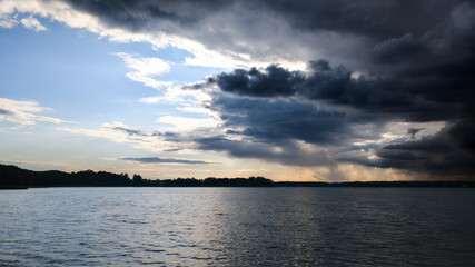 Obraz premium sunset over the river