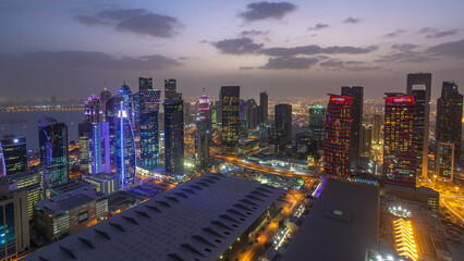 The skyline of the West Bay area from top in Doha day to night timelapse, Qatar.
