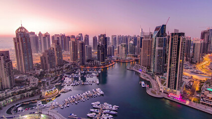 Obraz premium Dubai marina harbor panorama from night to day transition timelapse
