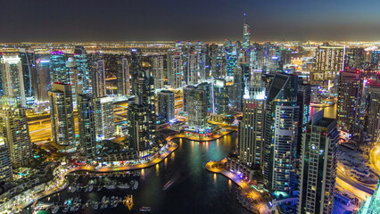 Dubai Marina with yachts day to night aerial timelapse
