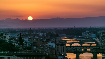 Skyline view of Arno River timelapse. Ponte Vecchio from Piazzale Michelangelo at Sunset, Florence,...