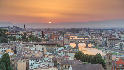 Skyline view of Arno River timelapse. Ponte Vecchio from Piazzale Michelangelo at Sunset, Florence, Italy.