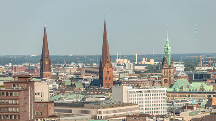 Obraz premium Aerial timelapse of Hamburg's historic city center skyline with iconic towers and spires. Germany
