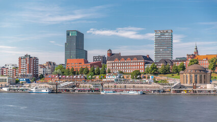 Fototapeta premium Timelapse of a ferry entering and exiting the Hamburg port terminal, with passengers on the pier and moving on stairs.