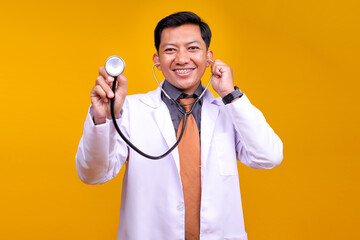Friendly Asian Doctor With Braces Extends A Stethoscope Towards The Camera ready For An Examination