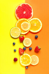 Composition with slices of juicy citrus fruits and berries on color background