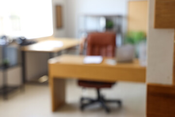 Blurred view of modern office with workplaces