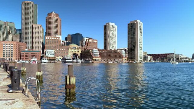 The Boston Harbor and financial district in Massachusetts, USA on a sunny summer morning.