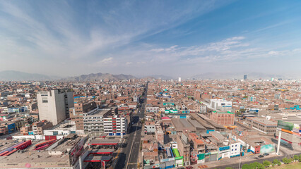 Panoramic skyline of Lima city from above with many buildings aerial timelapse. Lima, Peru