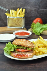 Beef burger with French fries, fresh made and tasty