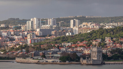 Obraz premium Aerial timelapse of Belem Tower in Lisbon, Portugal, historic landmark on the Tagus River