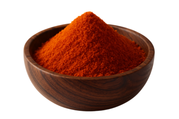 Fine chili powder in wooden bowl bright red hot seasoning for bold spicy recipes commonly used in global cuisines isolated on transparent background