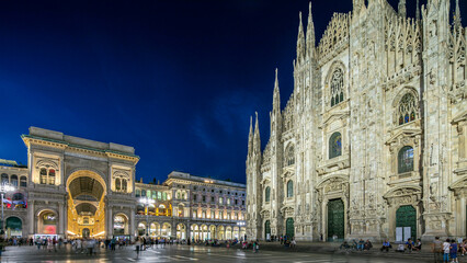 Fototapeta premium Cathedral Duomo di Milano and Vittorio Emanuele gallery day to night timelapse in Square Piazza Duomo, Milan, Italy.