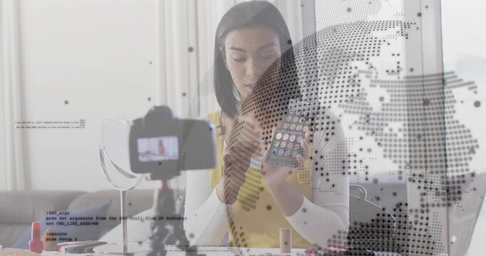 Female creator glancing phone then applying eyeshadow in makeup tutorial with digital overlay