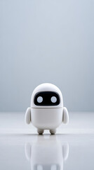 Cute white robot toy with black eyes on reflective surface