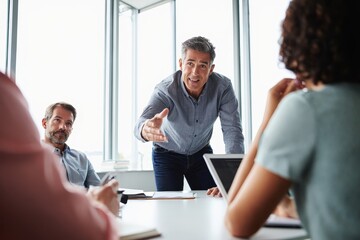 Business Meeting with Male Presenter and Team