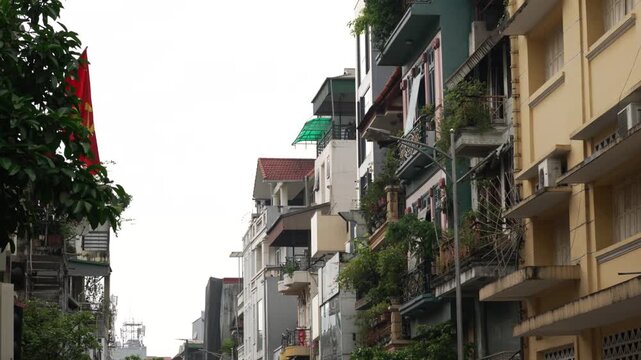 Vietnam communist national flag country local residents neighbourhood Hanoi homes real estate