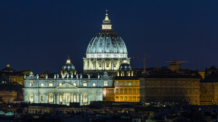 Night view at St. Peter's cathedral timelapse from the Pincio Landmark in Rome, Italy