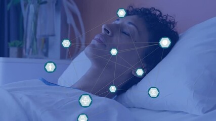 Camera panning revealing medical icons hovering around woman lying in bed, tracking health vitals - Powered by Adobe