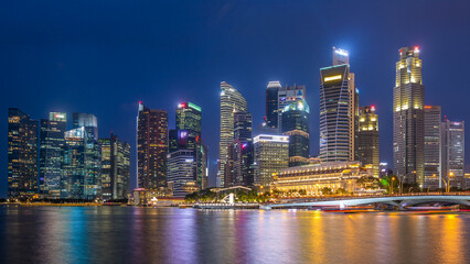 Fototapeta premium Stunning twilight view of Singapore city cityscape skyscrapers day to night timelapse