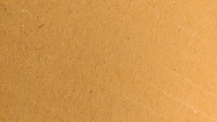 Background of brown kraft paper or cardboard texture. Brown recycled paper texture background.