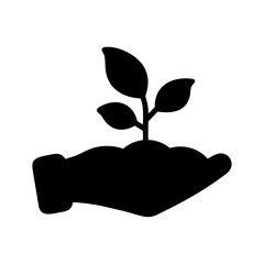 Hand holding a growing plant seedling silhouette