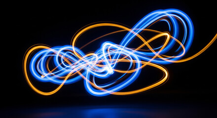 Abstract light painting photography blue and gold light trails on black background wallpaper design 4k