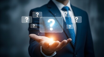 Businessman presenting illuminated question mark graphic