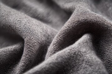 Gray textured background with creases and shadows