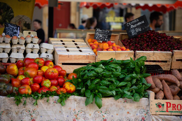 fresh fruits and vegetables at a farmer's market stall