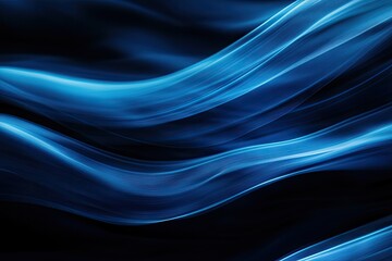 Obraz premium Abstract, flowing, luminous blue wave patterns against a deep black backdrop, elegant design.