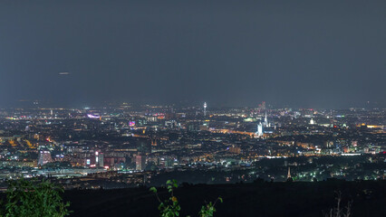 Skyline of Vienna from Danube Viewpoint Leopoldsberg aerial night timelapse.