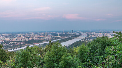 Skyline of Vienna from Danube Viewpoint Leopoldsberg aerial day to night timelapse. © HyperlapsePro