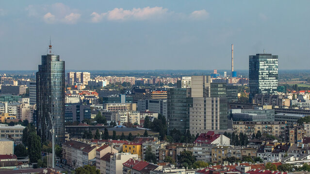 Panorama of the city center timelapse of Zagreb, Croatia, with modern and historic buildings, museums in the distance.