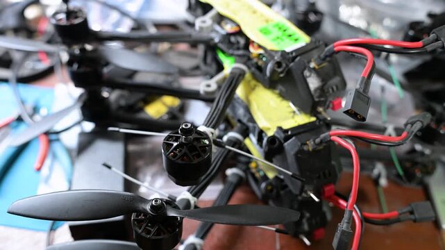 Close-up details reveal a custom-built FPV drone being weaponized in a Ukrainian workshop. This is the new face of low-cost, scalable warfare and homemade weaponry against Russia.